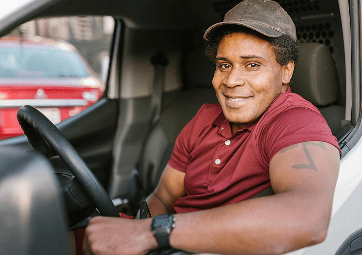 man in car